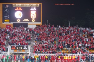 Hong Kong team and fans salute each other 