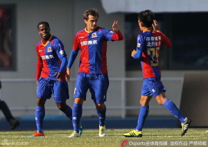 Triple Threat: BG goalscorers Carmelo Valencia, Danko Lazovic and Wen Chih-hao celebrate a winning end to the season