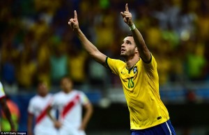 Renato Augusto celebrates a goal in a recent World Cup qualifier against Peru